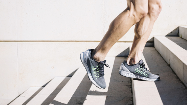 crop-legs-walking-upstairs_23-2147755510